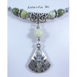 Plastic coated metal choker necklace, with jade beads with silver filigree pendant