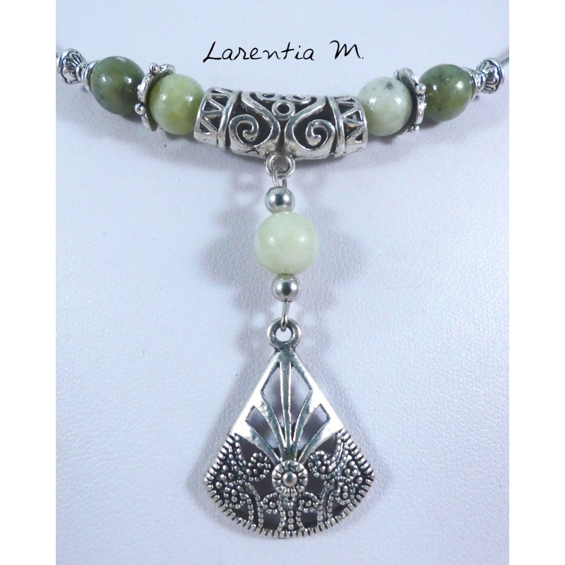 Plastic coated metal choker necklace, with jade beads with silver filigree pendant