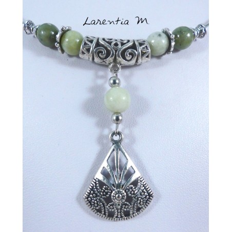 Plastic coated metal choker necklace, with jade beads with silver filigree pendant