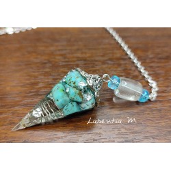 Resin pendulum with natural turquoises. Gold plated chain