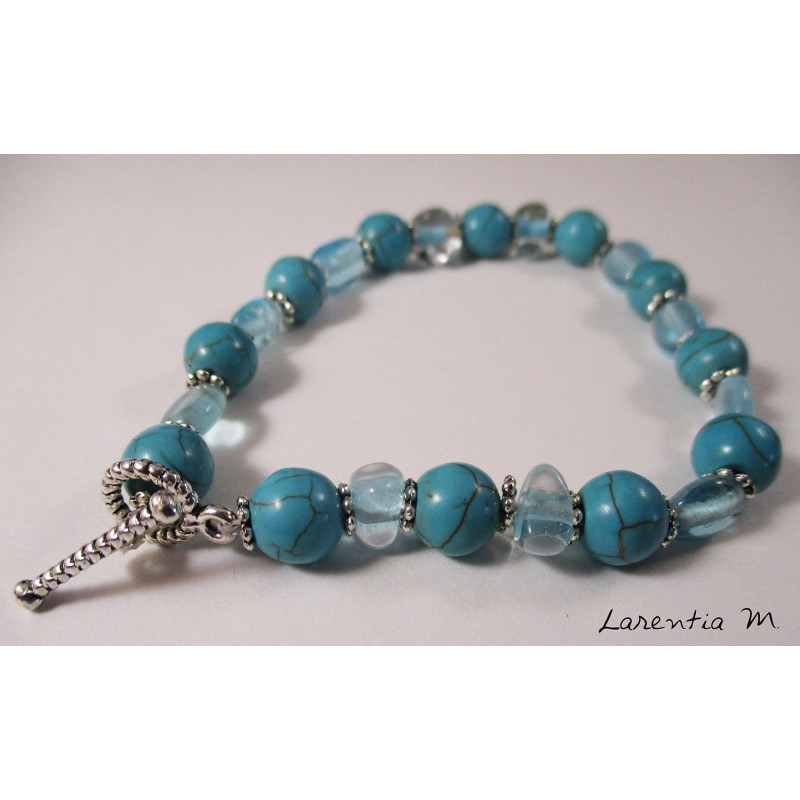 Bracelet turquoise beads, transparent and silver flowers