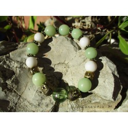 Bracelet perles buri (graines de palmier), métal, têtes bouddha, monté sur élastique