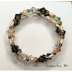 3-row bracelet made of Swarovski crystal beads, white and black, with white waxed beads. Shape memory metal