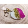 Heart key ring in degraded resin in red and pink tones with rhinestones, golden fastener.