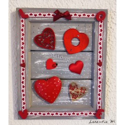 Gray wooden frame with red hearts