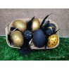 Basket with 7 hand-painted black and gold Easter eggs and feathers