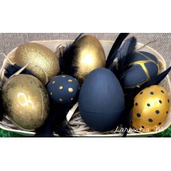 Basket with 7 hand-painted black and gold Easter eggs and feathers