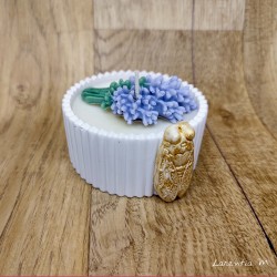 Vegetable wax candle jar with cicada and lavender bouquet overcandle