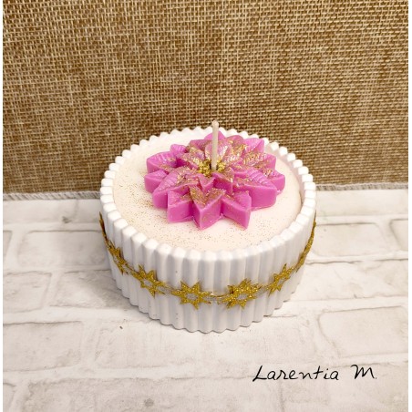 White ceramic pot with a poinsettia vegetable wax candle and "over-candle"
