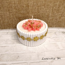 White ceramic pot with a poinsettia vegetable wax candle and "over-candle"