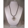 Pendant necklace zodiac sign "Sagittarius" with white shamballa pearl diamond on concrete pedestal decorated grey