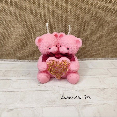 Candle with 2 pink teddy bears holding a heart