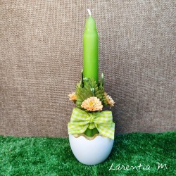 Easter white egg candle holder with candle, flowers and ribbon