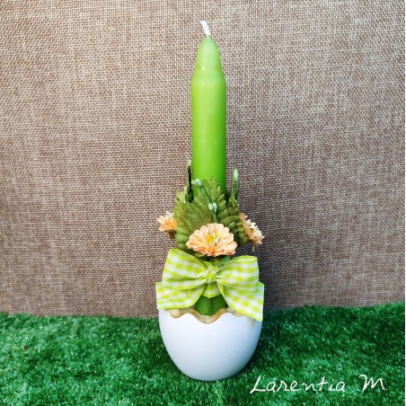 Easter white egg candle holder with candle, flowers and ribbon