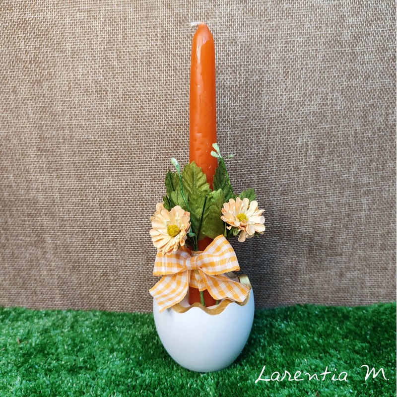 Easter white egg candle holder with candle, flowers and ribbon