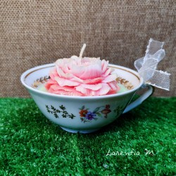 Peony candle in a porcelain cup and ribbon