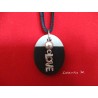 Pendant Necklace "Love" with grey waxed pearl on oval concrete pad painted black