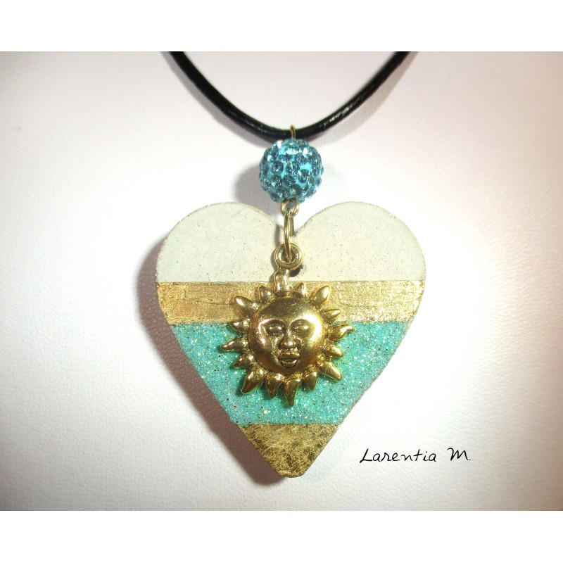concrete collar blue glittery heart and golden sheet metal, golden sun and blue Shamballa bead