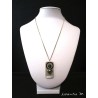 Pendant necklace with Swarovski crystal beads black ring and silver heart on concrete pad
