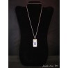 Necklace, pendant with Swarovski crystal ring and blue beads on concrete pad