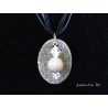 Oval granite necklace with silver relief metal bead