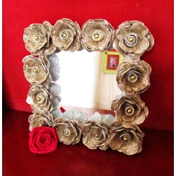 Mirror support strong cardboard, decorated with roses cut out of egg boxes and beads