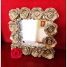 Mirror support strong cardboard, decorated with roses cut out of egg boxes and beads