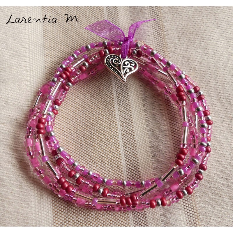 Bracelet 5 rangs en perles de rocaille tons roses-argent