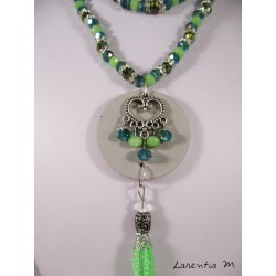 Necklace crystal green Bohemian beads, rhinestones, round concrete pendant with heart connector, green pearl pompon