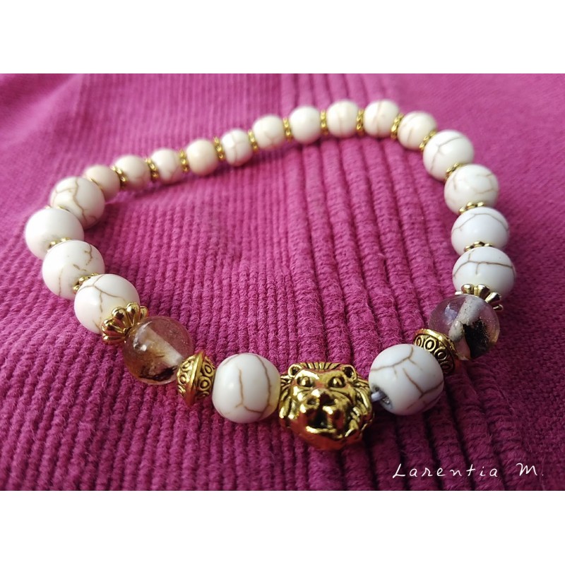 Ivory pearl bracelet and golden lion head