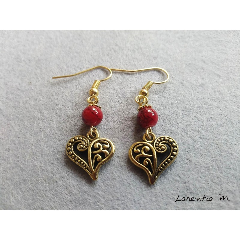 Red pearl earrings and golden heart