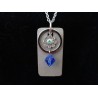 Necklace with Swarovski crystal ring and blue beads on concrete pad