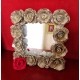Support mirroring strong cardboard, decorated with roses cut out of egg boxes and beads