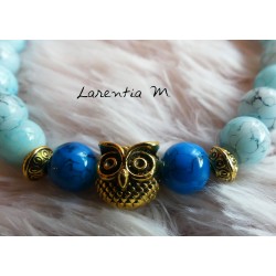 Bracelet perles de verre 8mm tons bleus, chouette dorée, élastique