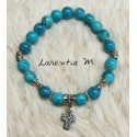 Bracelet perles de verre 8mm turquoise, croix et perles argentées, élastique