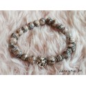 Bracelet perles de verre 8mm noires,beiges et grises, perles et lion métal argentés, élastique
