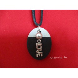 Pendant Necklace "Love" with grey waxed pearl on oval concrete pad painted black