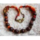 Long necklace 50 cm orange/red beads and feather