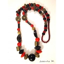 Necklace made with an orange scarf and wooden beads. Pretty heart-shaped clasp