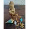Resin pendulum with natural turquoises and brass wire. Gold plated chain