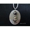 Necklace, pendant "Owl" with black hematite bead on concrete pad decorated silver